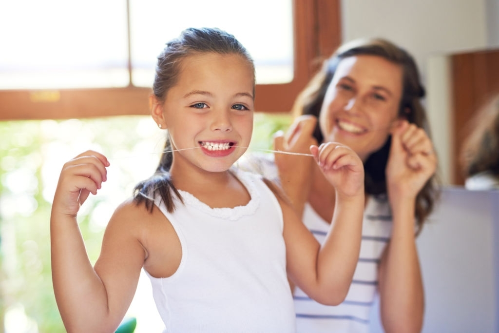 los niños pueden usar hilo dental